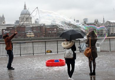 Performer produces giant bubbles in London, UK  Performer produces giant bubble London, UK to illustrate Has the bubble burst on edtech’s rapid expansion?