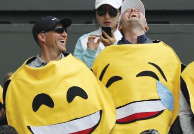 Two men wearing emoji costumes laughing Two men wearing emoji costumes laughing asametaphor for Is optimism justified?