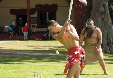 Maori men playing cricket at Waitangi New Zealand Maori men playing cricket at Waitangi New Zealand