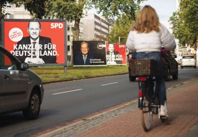 Election campaign billboards showing Olaf Scholz, chancellor candidate of the German Social Democrats (SPD), and Armin Laschet, chancellor candidate of the Christian Democrats (CDU/CSU) Election campaign billboards showing Olaf Scholz, chancellor candidate of the German Social Democrats (SPD), and Armin Laschet, chancellor candidate of the Christian Democrats (CDU/CSU) illustrating the current election campaign