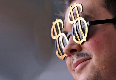 A man wears dollar shape glasses to illustrate US public universities refute claim they are amply funded