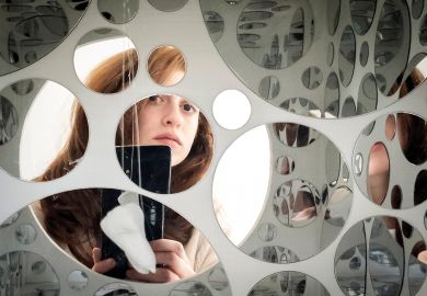  The view from artist Raphaela Frangou's mobile phone as she takes a photograph of herself being reflected by mirrors to illustrate Leeds bans ‘unfairly disparaging’ social media posts