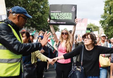  Demonstrators calling for greater government assistance for refugees 