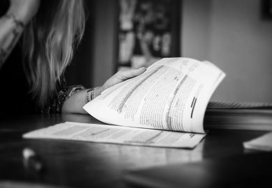 A woman thoroughly checking written work. To illustrate that to defend against prejudice, Agnieszka Piotrowska had to make her students’ work unassailable. A woman thoroughly checking written work. To illustrate that to defend against prejudice, Agnieszka Piotrowska had to make her students’ work unassailable.