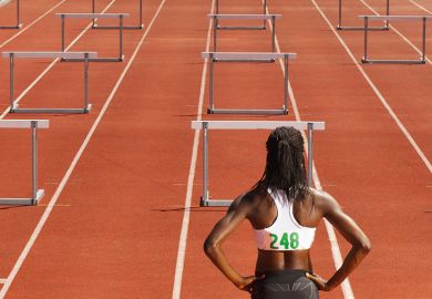 woman in front of hurdles