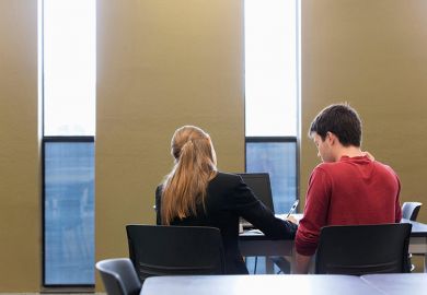 Female mentor with student