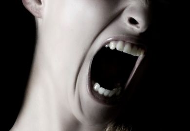 Woman screaming (close-up)