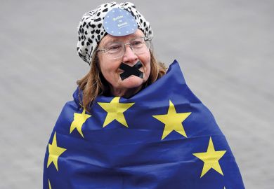 Woman wrapped in EU flag