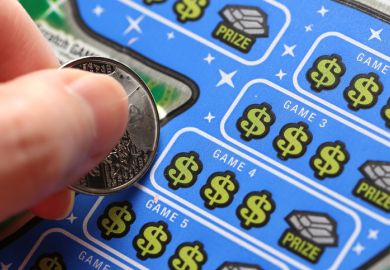 Woman scratching lottery tickets