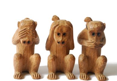 Wood-carved monkeys, see, hear, speak no evil
