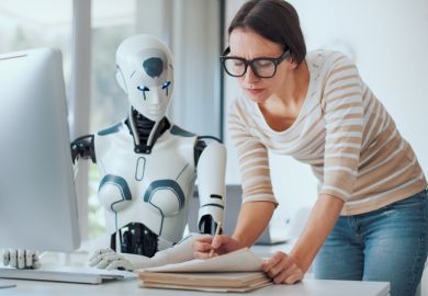 A woman and a robot work together