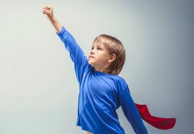 Young boy dressed as superhero, world's best young universities