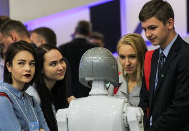 Young people communicate with robot