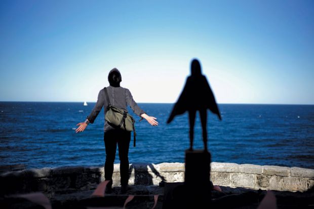 A person mimicking a statue A person mimicking a statue