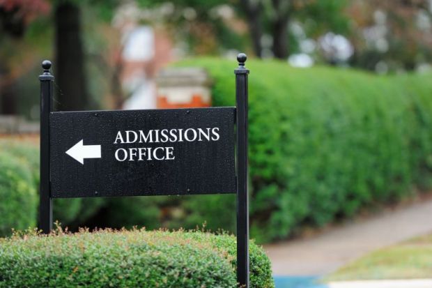 Sign points to 'admissions office'