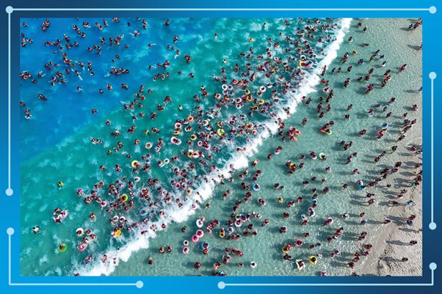 An aerial view of swimmers at a water park in Zhengzhou, Henan Province of China. To illustrate the shifting global order in the World University Rankings as Asian universities’ resumed upward trajectory takes them past main Europe for the first time. An aerial view of swimmers at a water park in Zhengzhou, Henan Province of China. To illustrate the shifting global order in the World University Rankings as Asian universities’ resumed upward trajectory takes them past main Europe for the first time.
