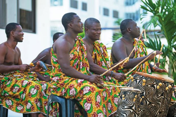 African musicians playing instruments