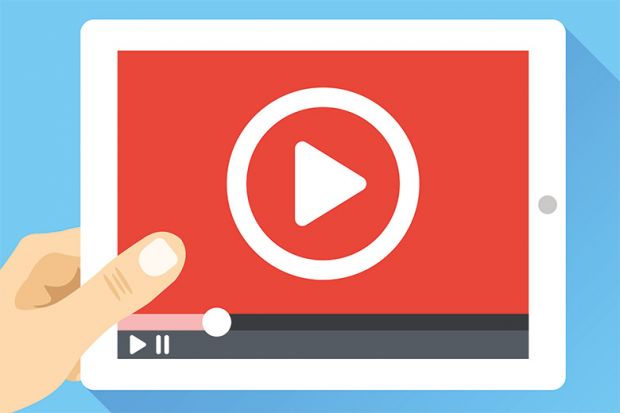 Tablet PC showing video play button (illustration) Tablet PC showing video play button (illustration)