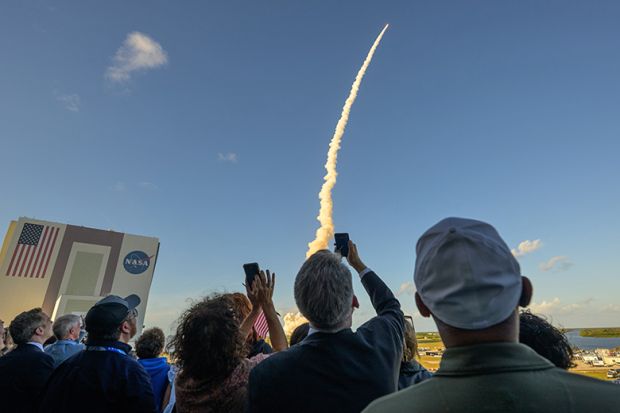 Guests watch the launch of NASA’s Space Launch System rocket carrying the Orion spacecraft with astronauts for NASA’s Artemis II mission, Wednesday, 1 April, 2026.