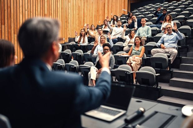 A speaker nominates people in the audience to ask questions