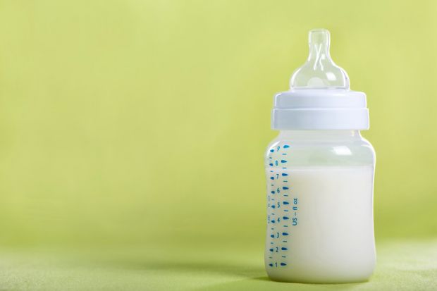 A baby bottle full of milk
