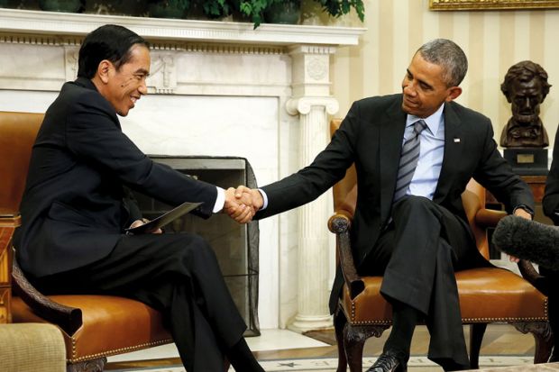 Barack Obama and Joko Widodo shaking hands, Oval Office, White House Barack Obama and Joko Widodo shaking hands, Oval Office, White House