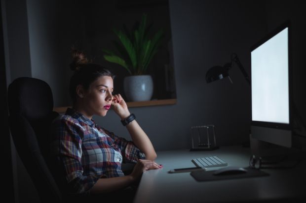 A woman stares at a blank screen, symbolising the difficulty of finding relevance in the digital era