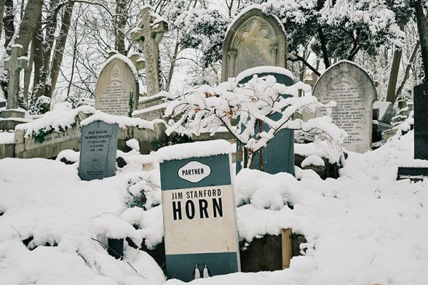 The gravestone of Jim Stanford Horn shaped like a book by Penguin Books publishing house is covered in snow at Highgate Cemetery on 12 December, 2022 in London, England. To illustrate that reading is dying out on UK campuses. The gravestone of Jim Stanford Horn shaped like a book by Penguin Books publishing house is covered in snow at Highgate Cemetery on 12 December, 2022 in London, England. To illustrate that reading is dying out on UK campuses.