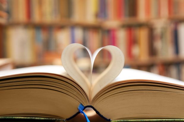 A book with its pages folded into a heart shape A book with its pages folded into a heart shape, symbolising publc support for universities