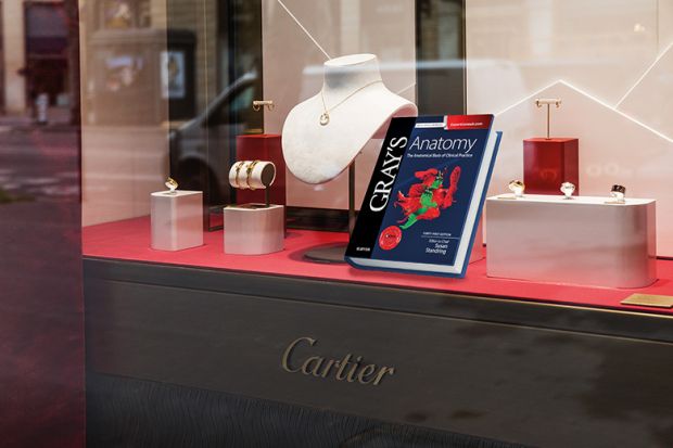 Copy of Gray's Anatomy is displayed in a jewellery shop window
