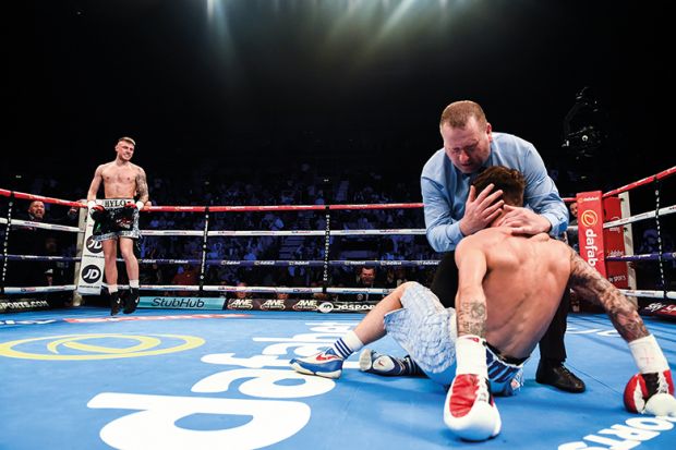 The referee calls the fight to a stoppage during their vacant IBF European Lightweight Championship to illustrate Remember your empathy if you want to avoid violence on campus