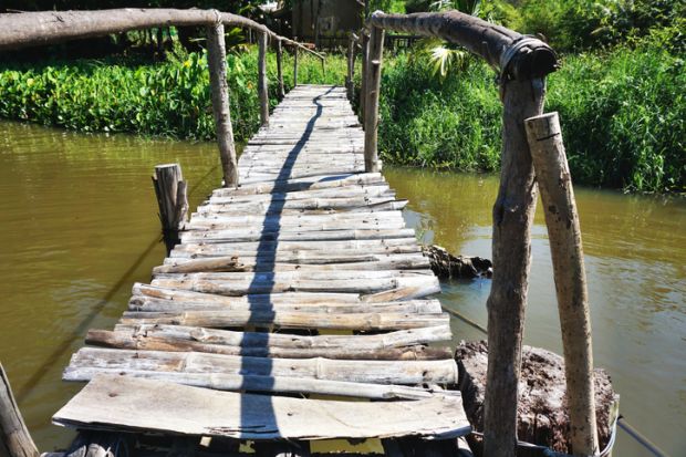 Rickety wooden bridge Rickety wooden bridge