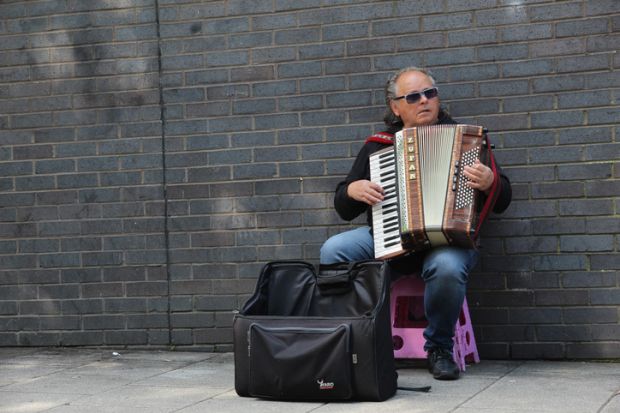 Busker playing the accordion