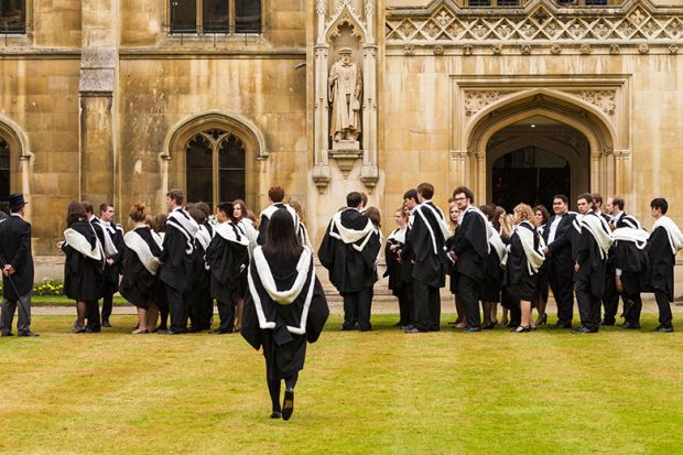 Cambridge University students in gowns on graduation day at Corpus Christi College, England Cambridge University students in gowns on graduation day at Corpus Christi College, England