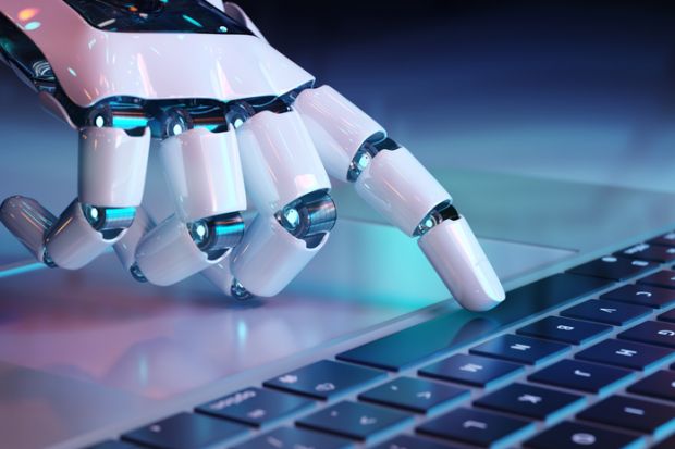 A robot hand presses a computer space bar, symbolising ChatGPT