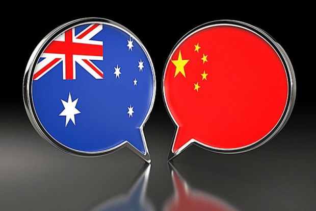 Speech bubble with Chinese and Australian flags, sybolising collaboration Speech bubble with Chinese and Australian flags, sybolising collaboration