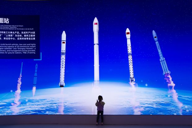 A visitor at the Shanghai Expo Trade Center in Shanghai, China, on 27 April 2025, during China’s Space Day to promote the education of aerospace science and technology for youth in China.