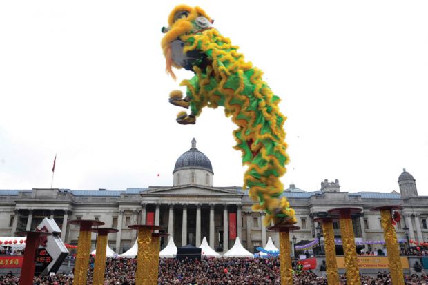 Chinese dragon performer in London