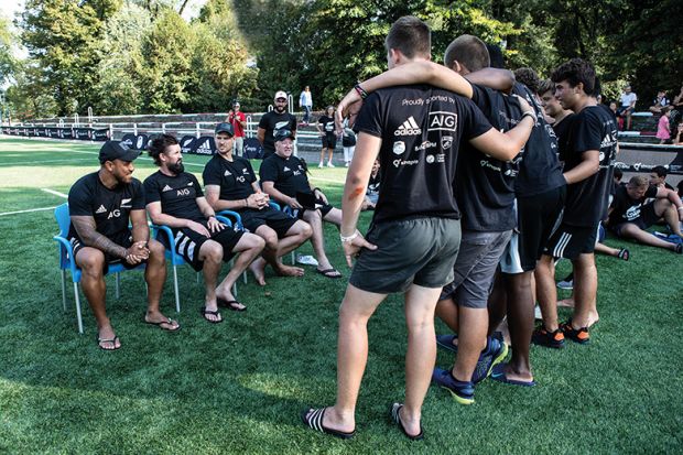 Students come together to hear the judgement of the coaches Students come together to hear the judgement of the coaches, illustrating giving effective feedback