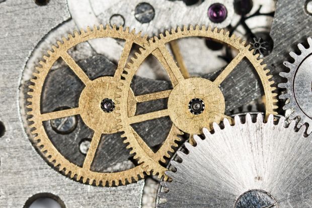 Two cogwheels driving a mechanism, symbolising innovation