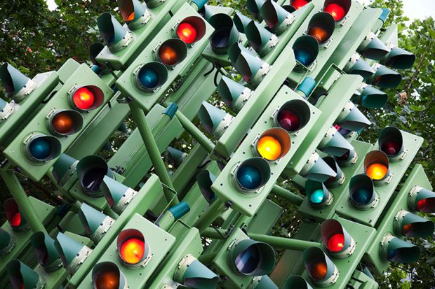 A sculpture made from traffic lights in East London. The lights which light red amber and green is in the shape of an abstract tree. To illustrate the need for a reset of how the OfS approaches watchdog duties and a rethink of England’s regulatory system.