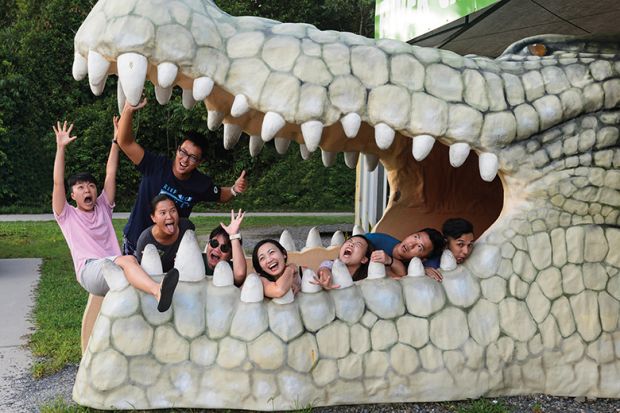 People inside giant crocodile