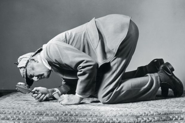 Detective inspects floor Detective inspects floor