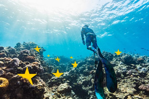 A diver in the Great Barrier Reef, Australia, with stars from the European Union flag on the seabed. To illustrate Australian universities renewing their campaign to join Horizon Europe. A diver in the Great Barrier Reef, Australia, with stars from the European Union flag on the seabed. To illustrate Australian universities renewing their campaign to join Horizon Europe.