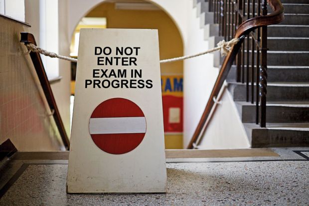'Do not enter. Exam in progress' sign on staircase