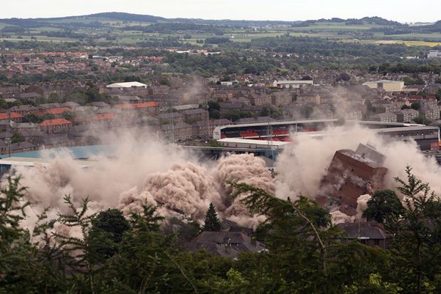 A general view of the Butterburn and Bucklemaker multi storey flats in the Hilltown area of Dundee, being razed to the ground during demolition. Illustrating that cuts at the University of Dundee will take a ‘wrecking ball’ to research and local economy A general view of the Butterburn and Bucklemaker multi storey flats in the Hilltown area of Dundee, being razed to the ground during demolition. Illustrating that cuts at the University of Dundee will take a ‘wrecking ball’ to research and local economy