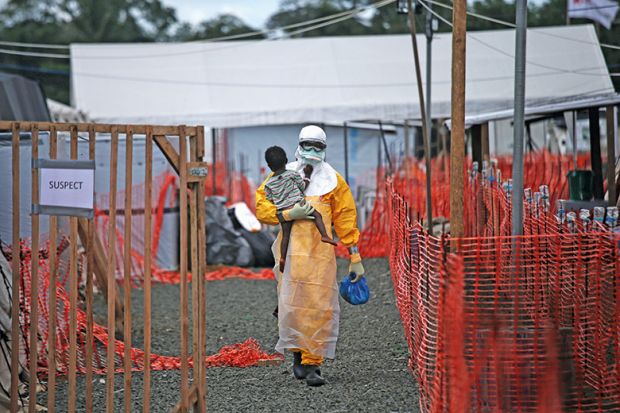 Ebola doctor with child