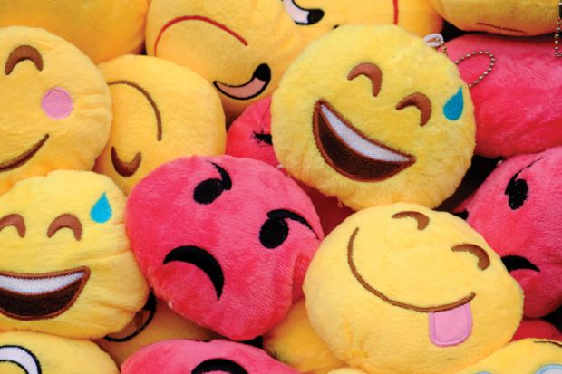 Pile of soft toy emoji faces