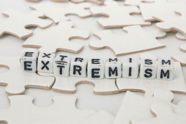 'Extremism' spelled in letter blocks 'Extremism' spelled in letter blocks