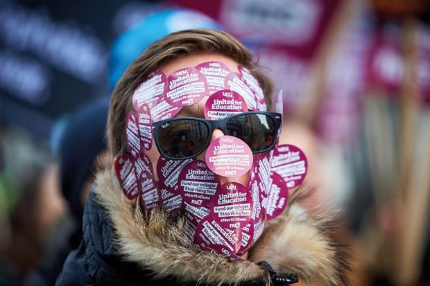 Face covered with UCU stickers